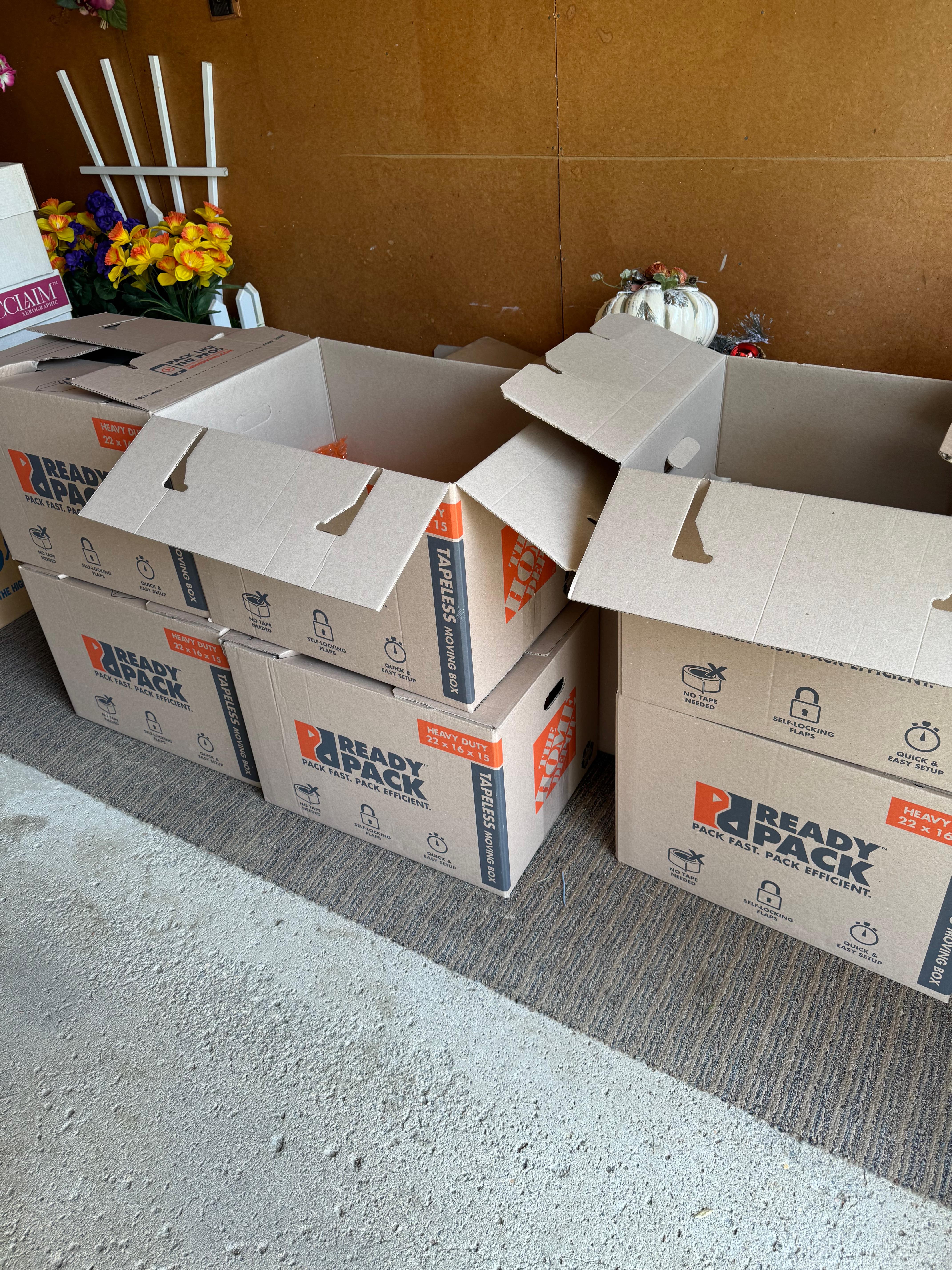 Ready2Pack moving boxes stacked for packing and protecting belongings during water damage restoration work
